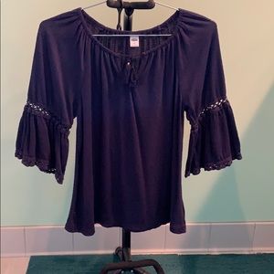 2 blue and white shirts